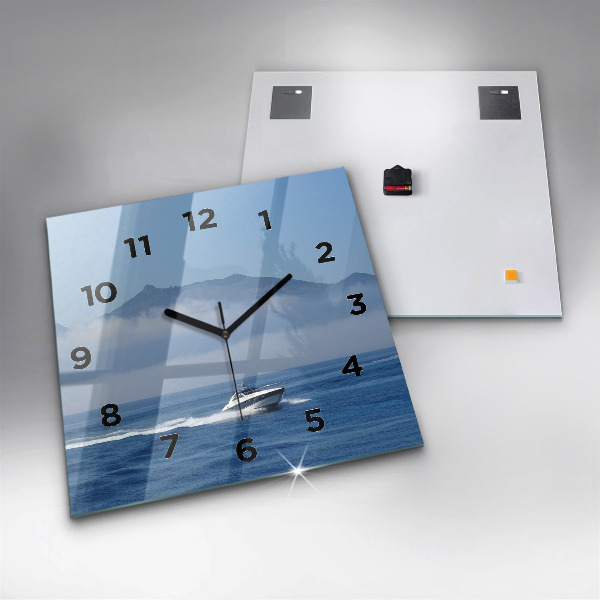 Square wall clock A boat floating on the ocean