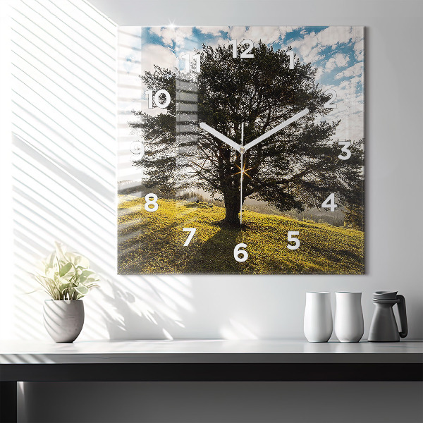 Square wall clock A tree on a hill