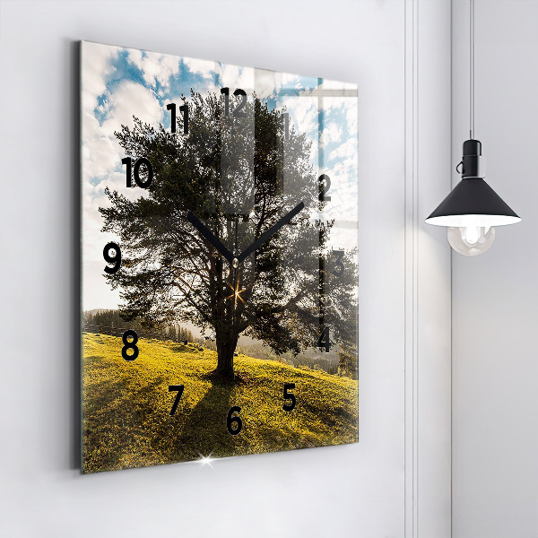 Square wall clock A tree on a hill