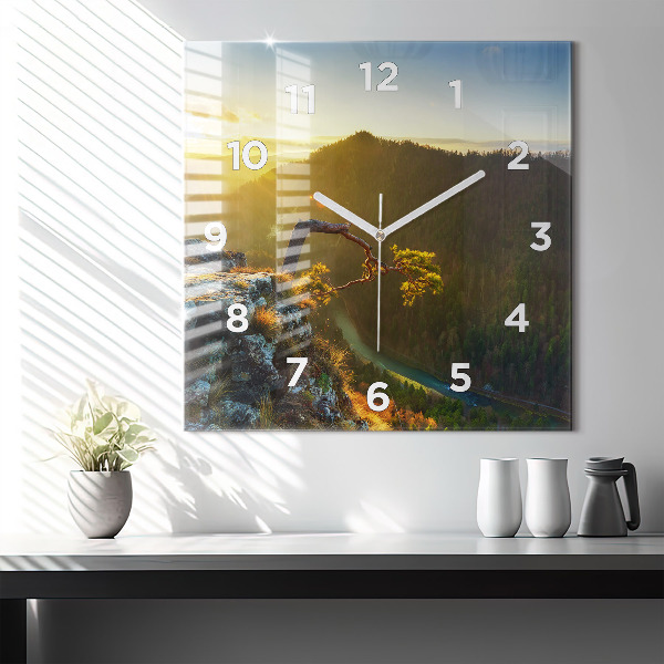 Square wall clock Sunset over the mountains