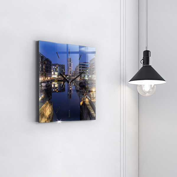 Square wall clock The city lit up at night