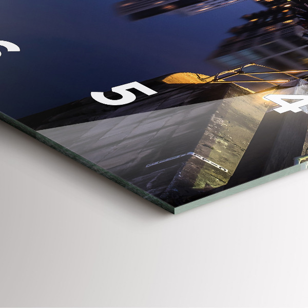 Square wall clock The city lit up at night