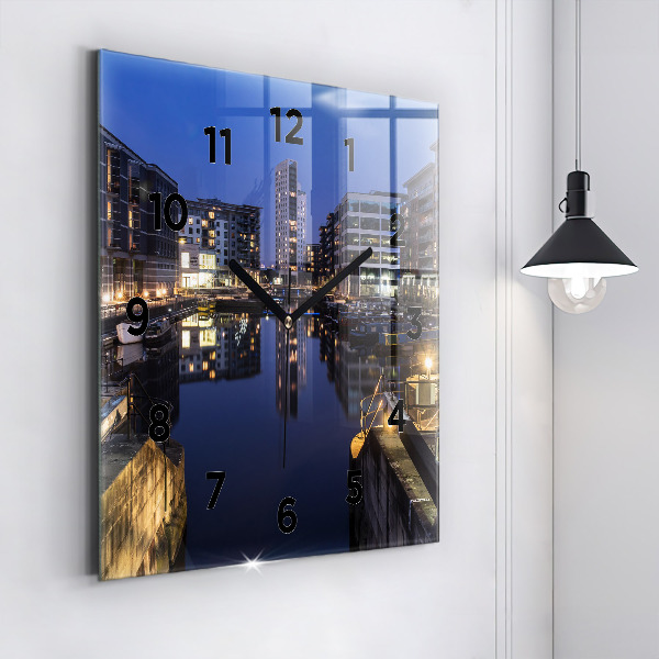 Square wall clock The city lit up at night