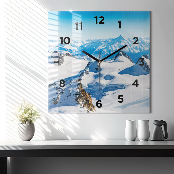 Square wall clock Skier in the Alps