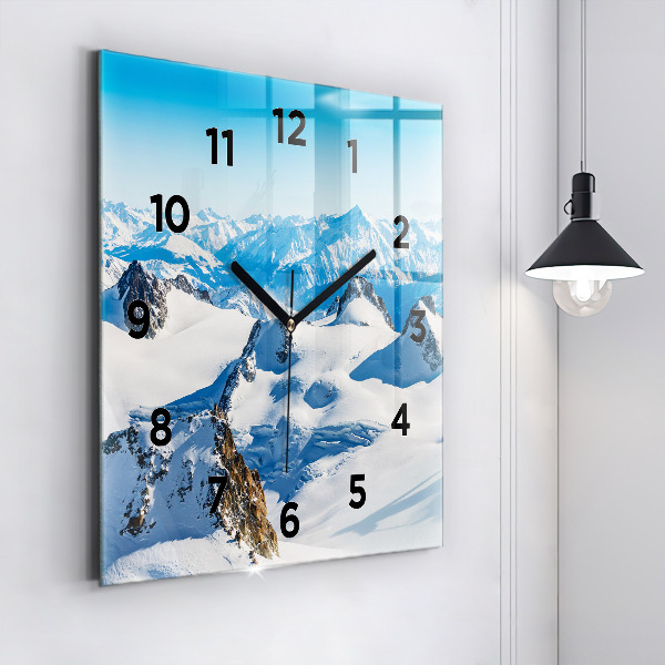 Square wall clock Skier in the Alps