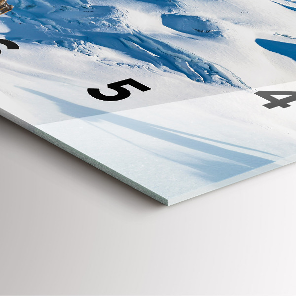 Square wall clock Skier in the Alps