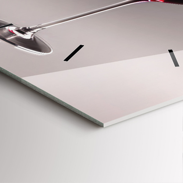 Square wall clock A glass of red wine