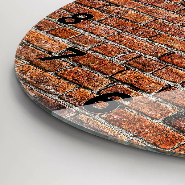 Round glass wall clock Old brick wall