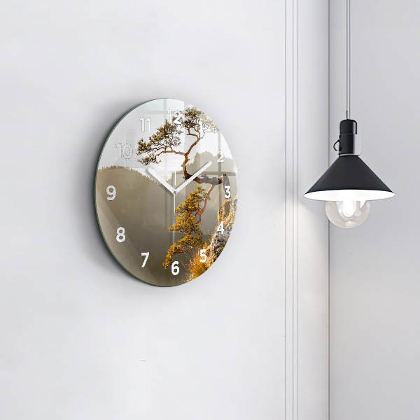 Round glass wall clock A tree in the mountains