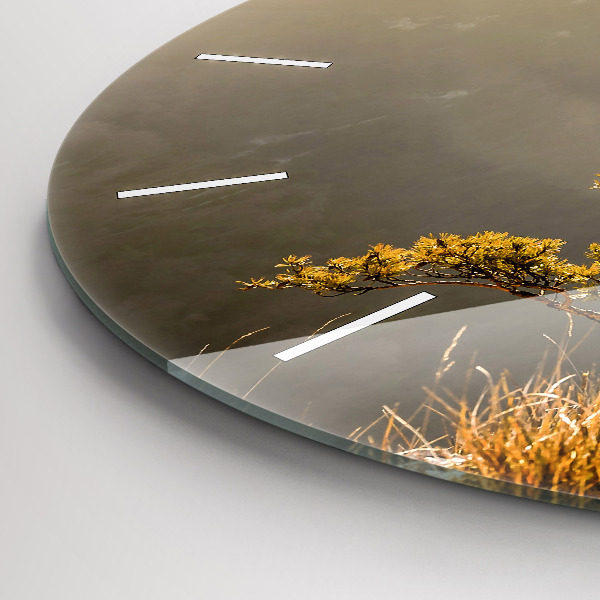 Round glass wall clock A tree in the mountains