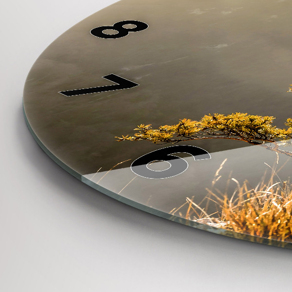 Round glass wall clock A tree in the mountains