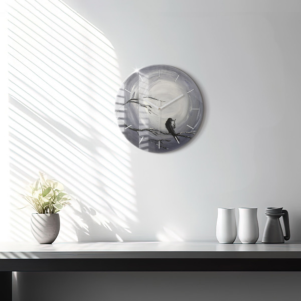 Round glass wall clock Raven in the moonlight