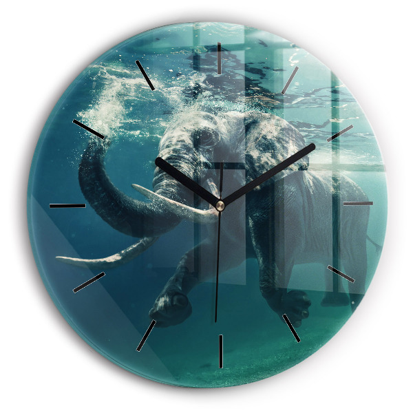 Round glass wall clock Swimming elephant in the ocean