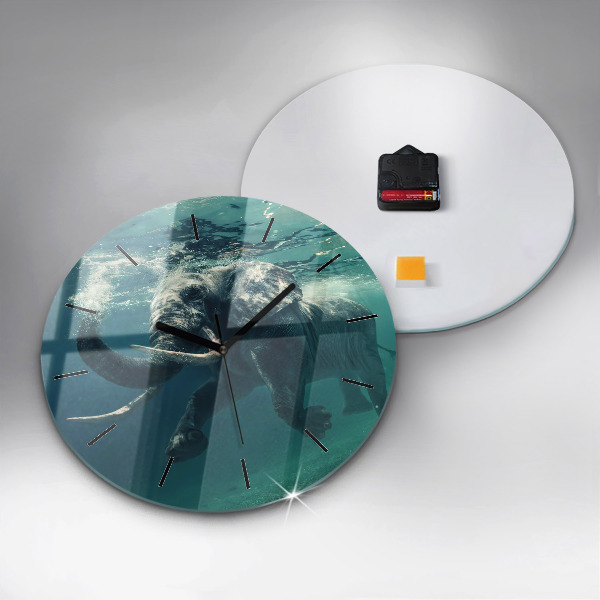 Round glass wall clock Swimming elephant in the ocean
