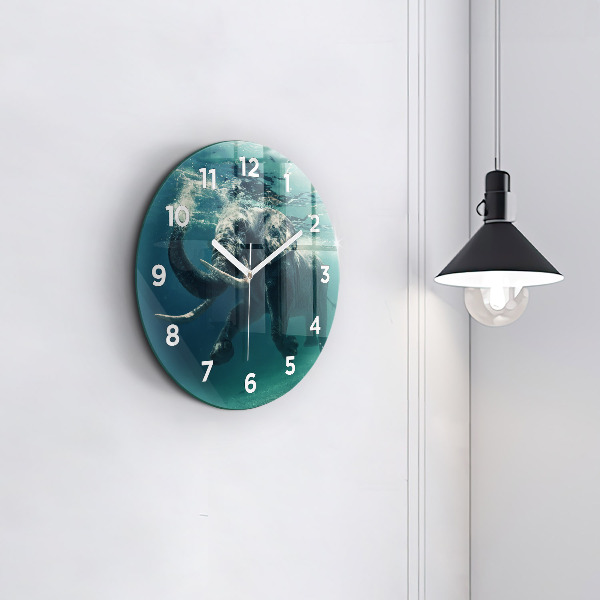Round glass wall clock Swimming elephant in the ocean