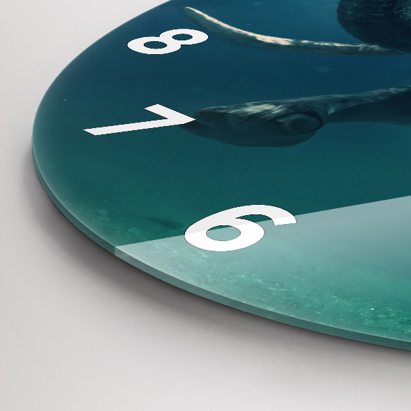 Round glass wall clock Swimming elephant in the ocean