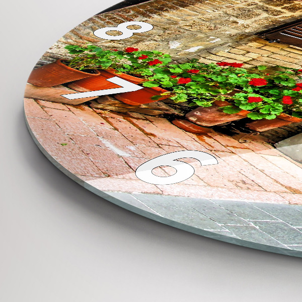 Round glass wall clock A picturesque street