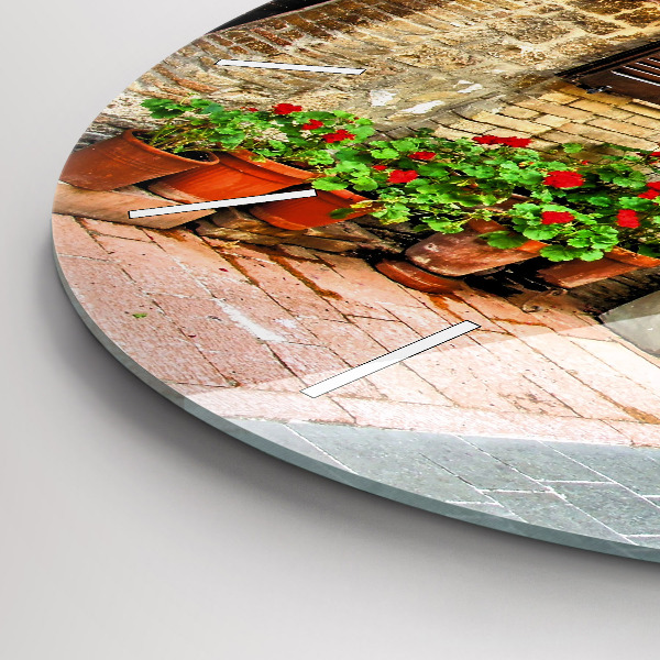 Round glass wall clock A picturesque street