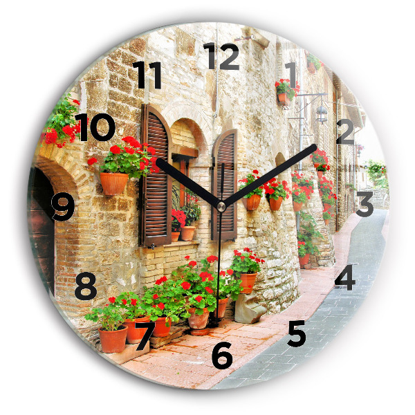 Round glass wall clock A picturesque street