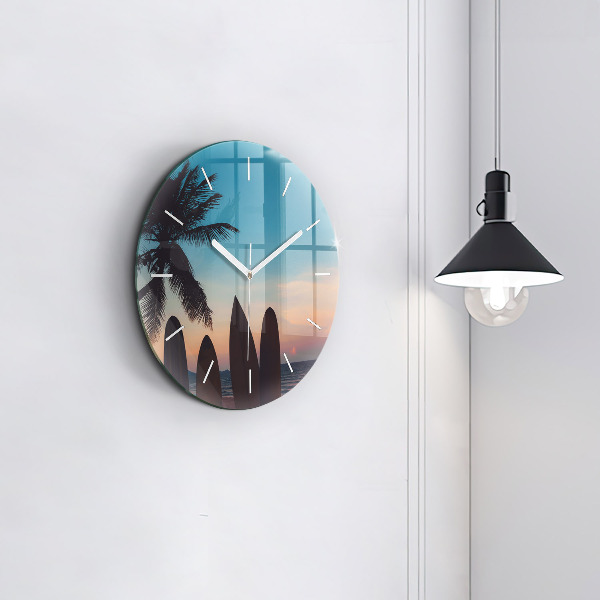 Round glass wall clock Surfing on the beach