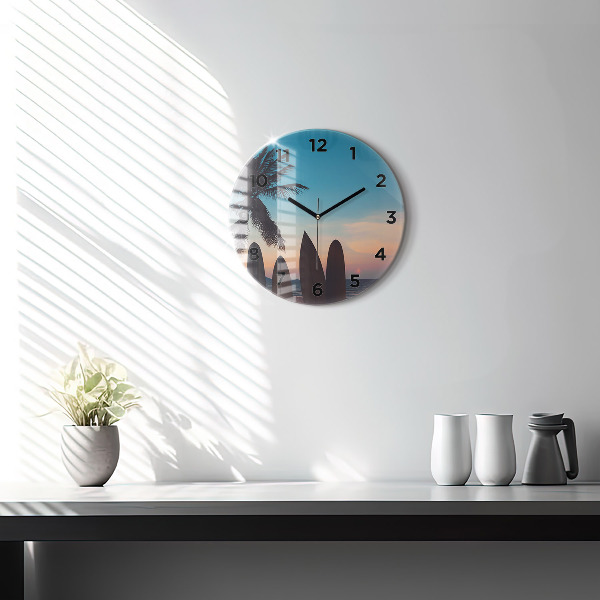 Round glass wall clock Surfing on the beach