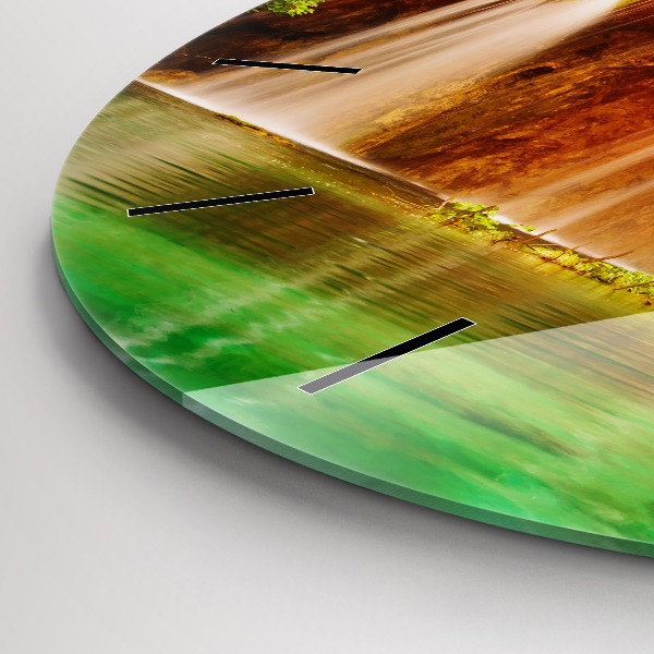 Round glass wall clock View of the waterfall