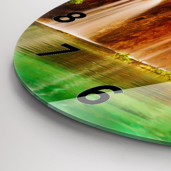 Round glass wall clock View of the waterfall