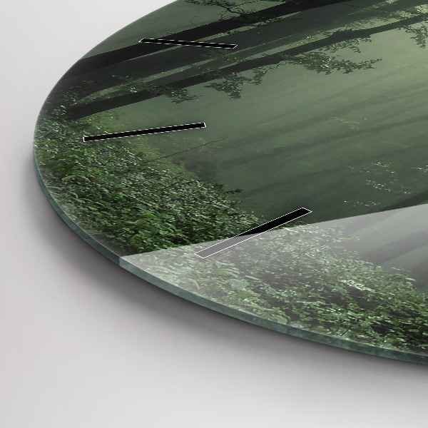 Round glass wall clock Misty forest in the morning