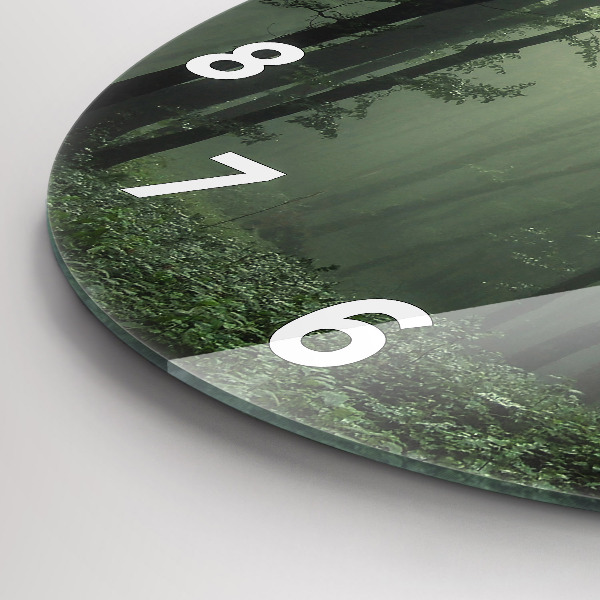 Round glass wall clock Misty forest in the morning