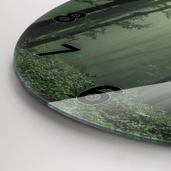 Round glass wall clock Misty forest in the morning