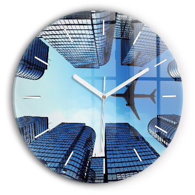 Round glass wall clock Airplane over buildings