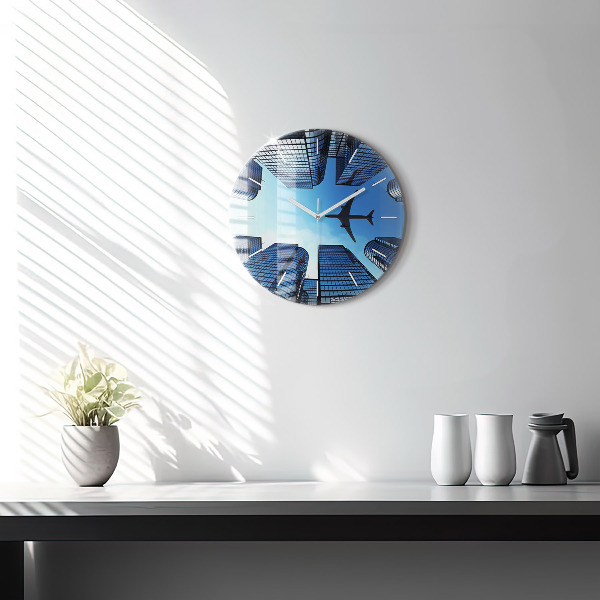 Round glass wall clock Airplane over buildings