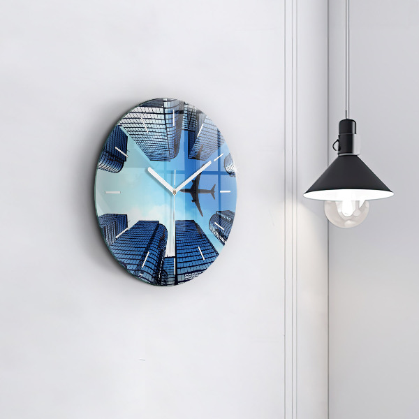 Round glass wall clock Airplane over buildings