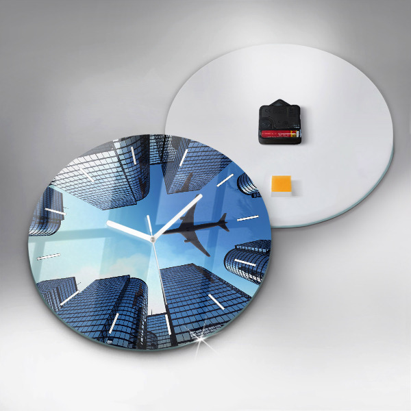 Round glass wall clock Airplane over buildings