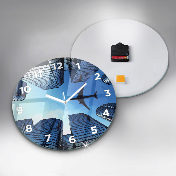 Round glass wall clock Airplane over buildings