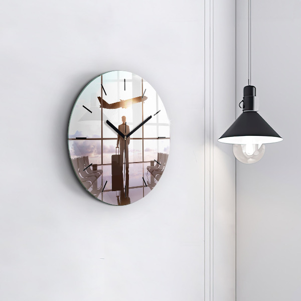 Round glass wall clock Man at the airport