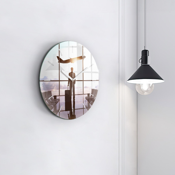 Round glass wall clock Man at the airport