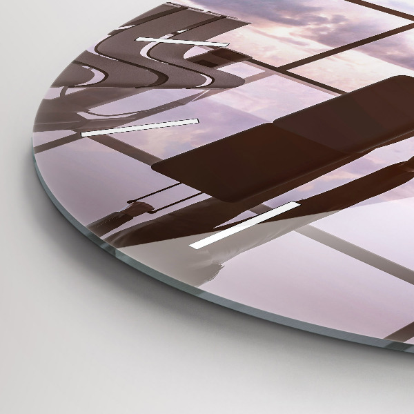 Round glass wall clock Man at the airport