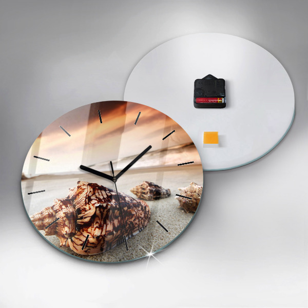 Round glass wall clock A shell on the beach