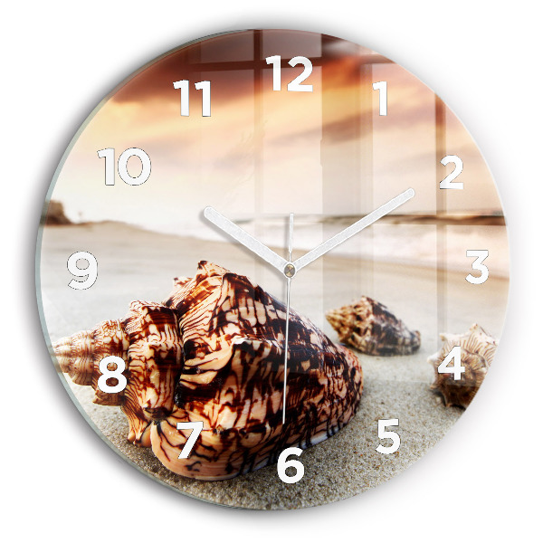 Round glass wall clock A shell on the beach