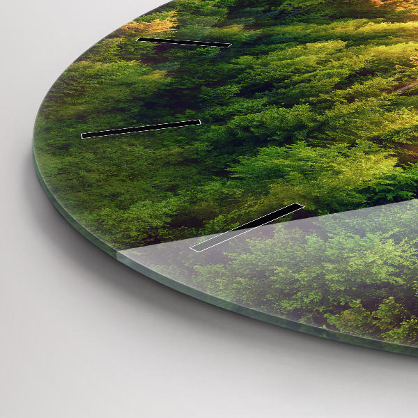 Round glass wall clock Sunset over the hills