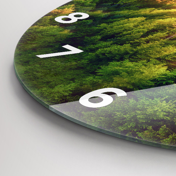 Round glass wall clock Sunset over the hills