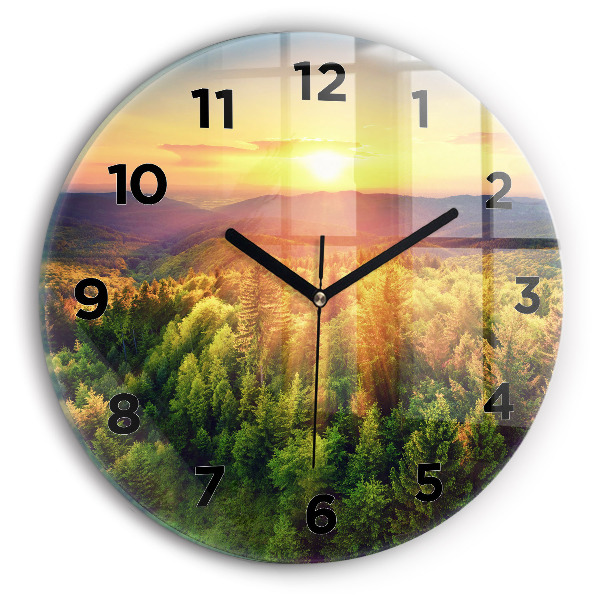 Round glass wall clock Sunset over the hills