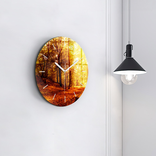Round glass wall clock Forest landscape in the sun