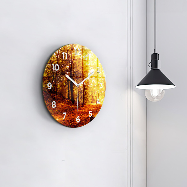 Round glass wall clock Forest landscape in the sun