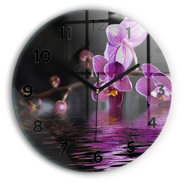Round glass wall clock Orchid flower on the water