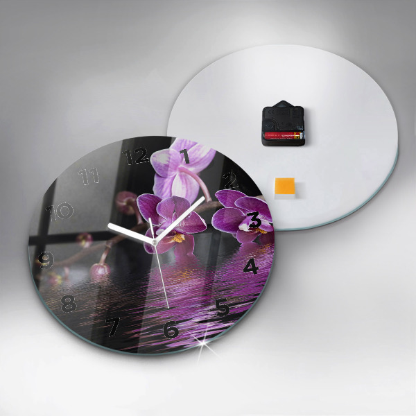 Round glass wall clock Orchid flower on the water