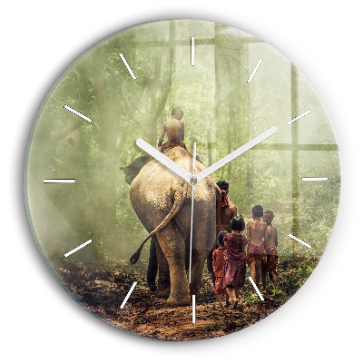 Round glass wall clock Children leading an elephant