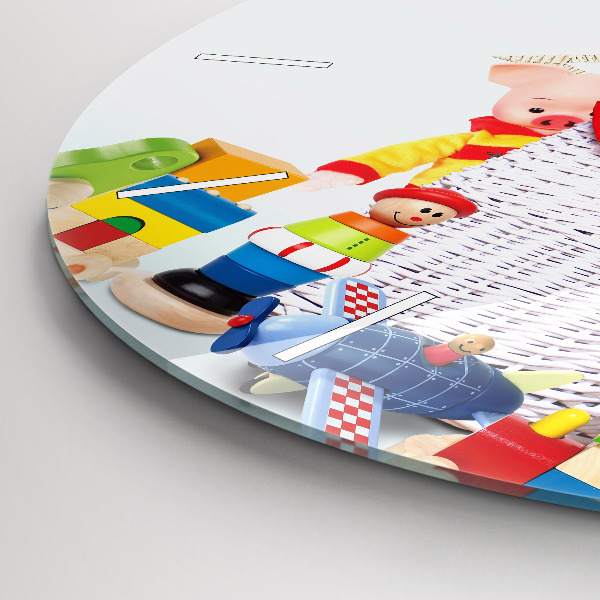 Round glass wall clock Wicker basket with toys