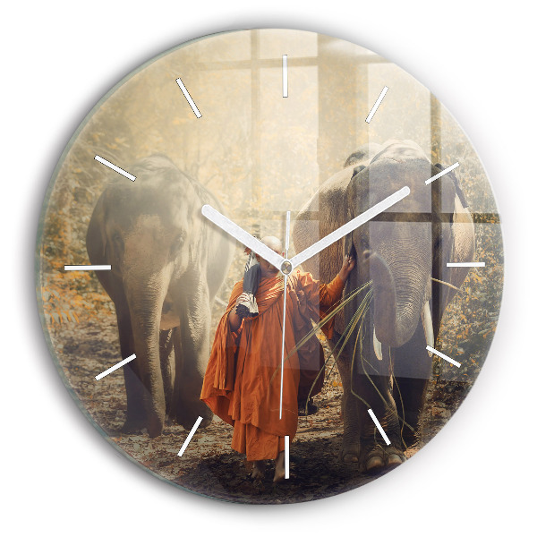 Round glass wall clock Monk leading elephants